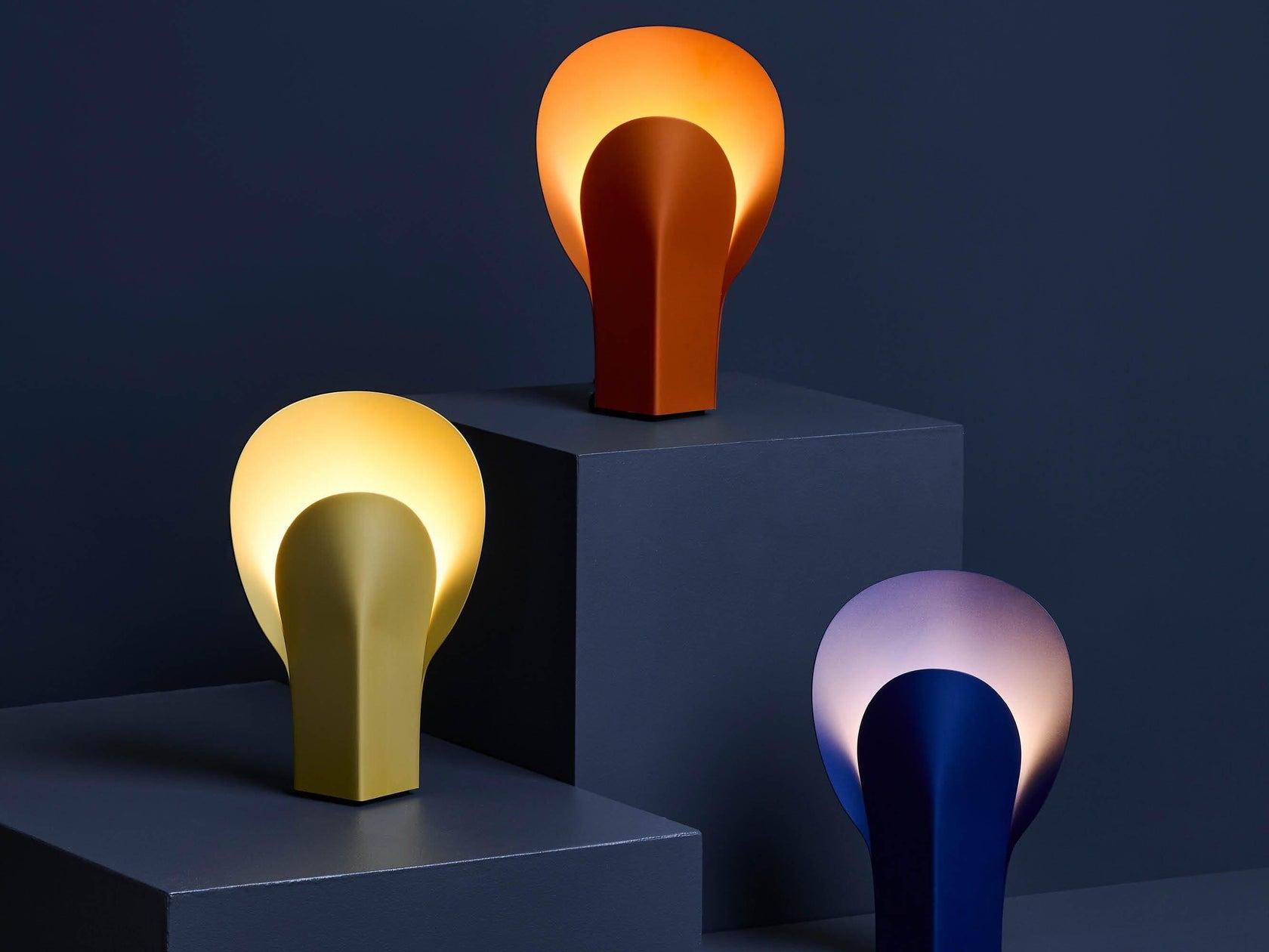 Collection of sculptural table lamps featuring contemporary artistic forms and premium decorative finishes.