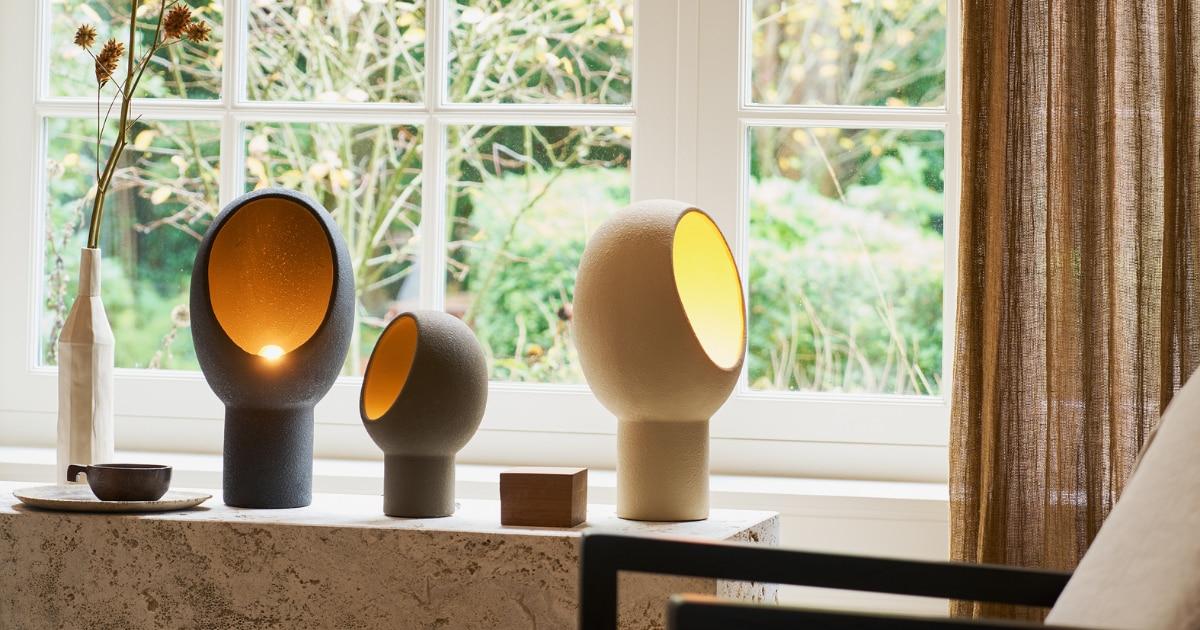 Collection of sculptural table lamps featuring contemporary artistic forms and premium decorative finishes.