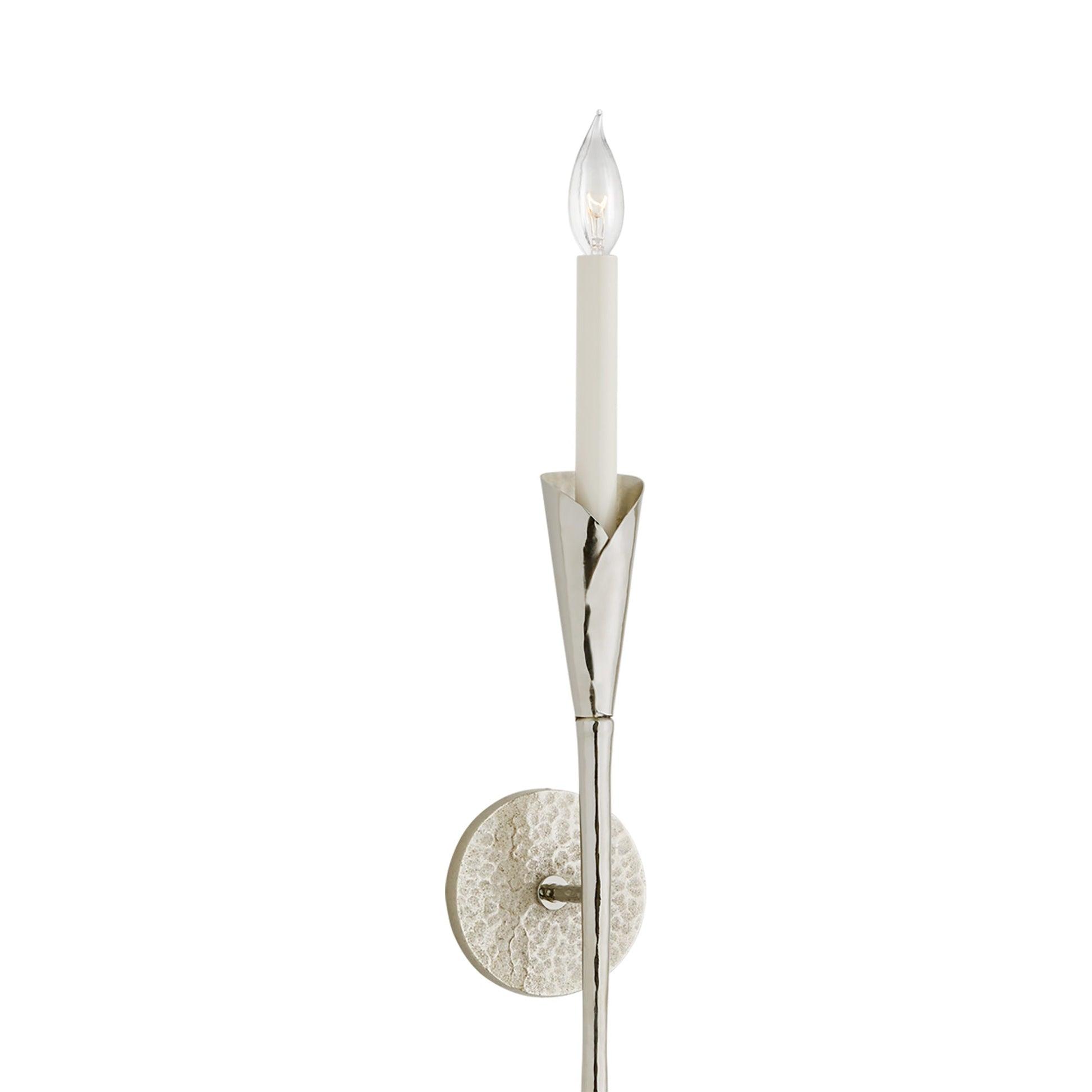 Candle-style wall lamp photographed on a clean white studio background.