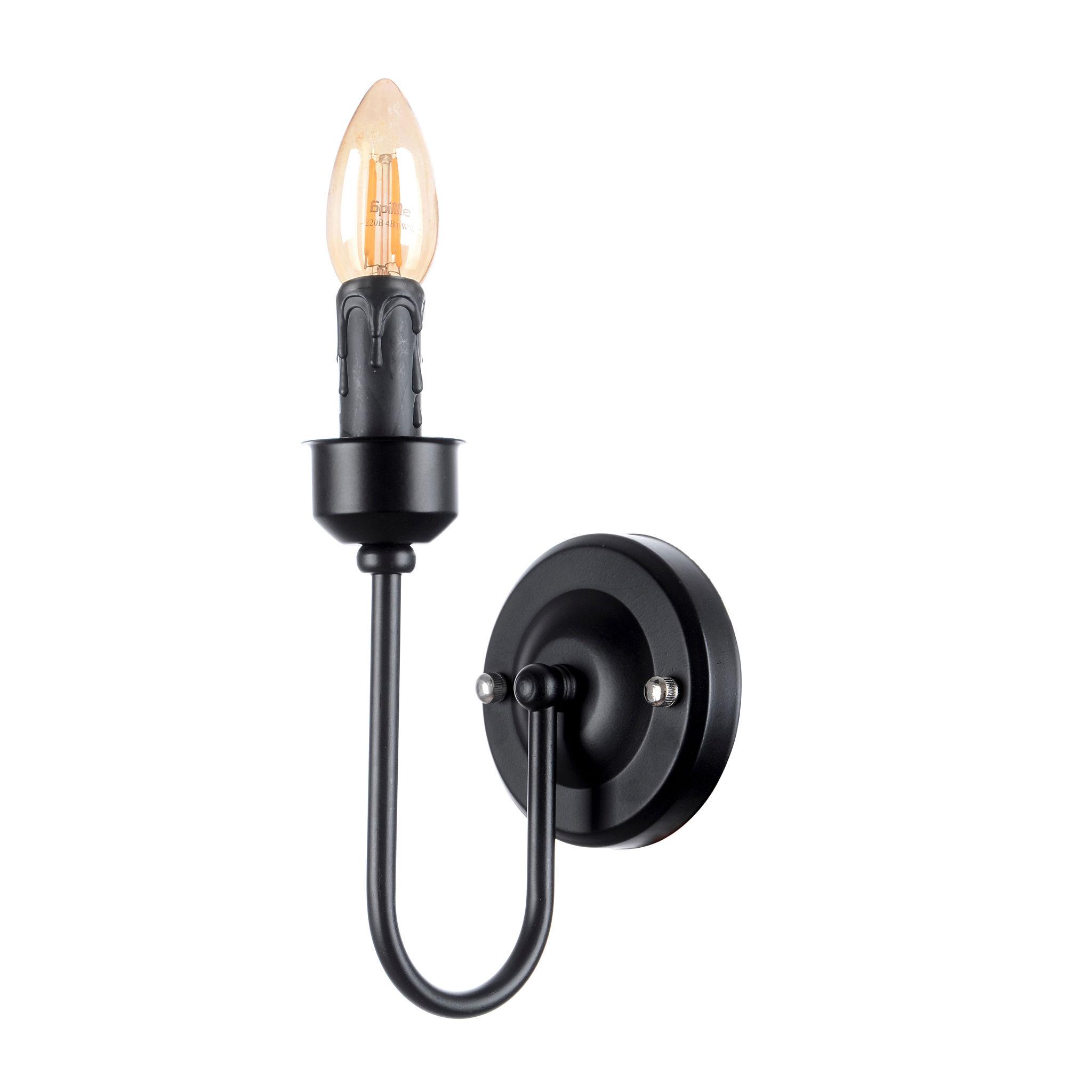 Candle-style wall lamp photographed on a clean white studio background.