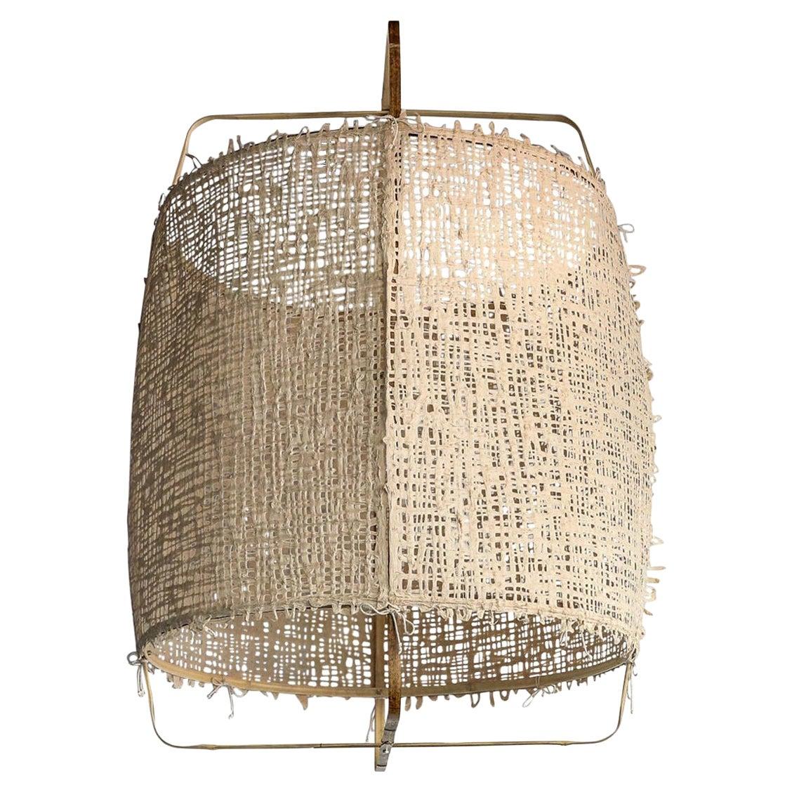 Handwoven rattan chandelier photographed on a clean white studio background.