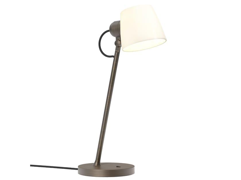 Reading table lamp photographed on a clean white background showcasing its adjustable design and premium finishes.