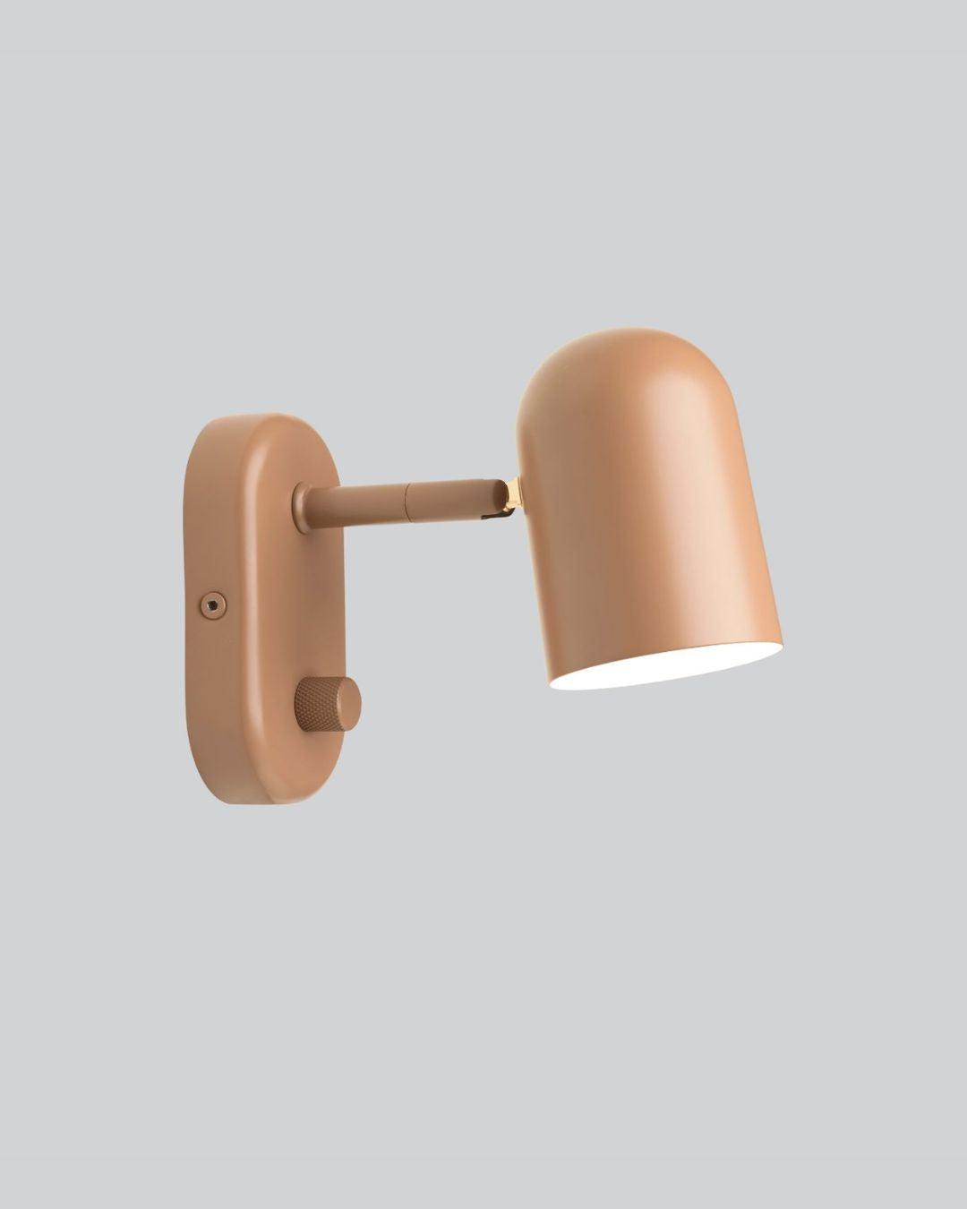 Front view of a Scandinavian wall lamp with natural materials and clean architectural lines.
