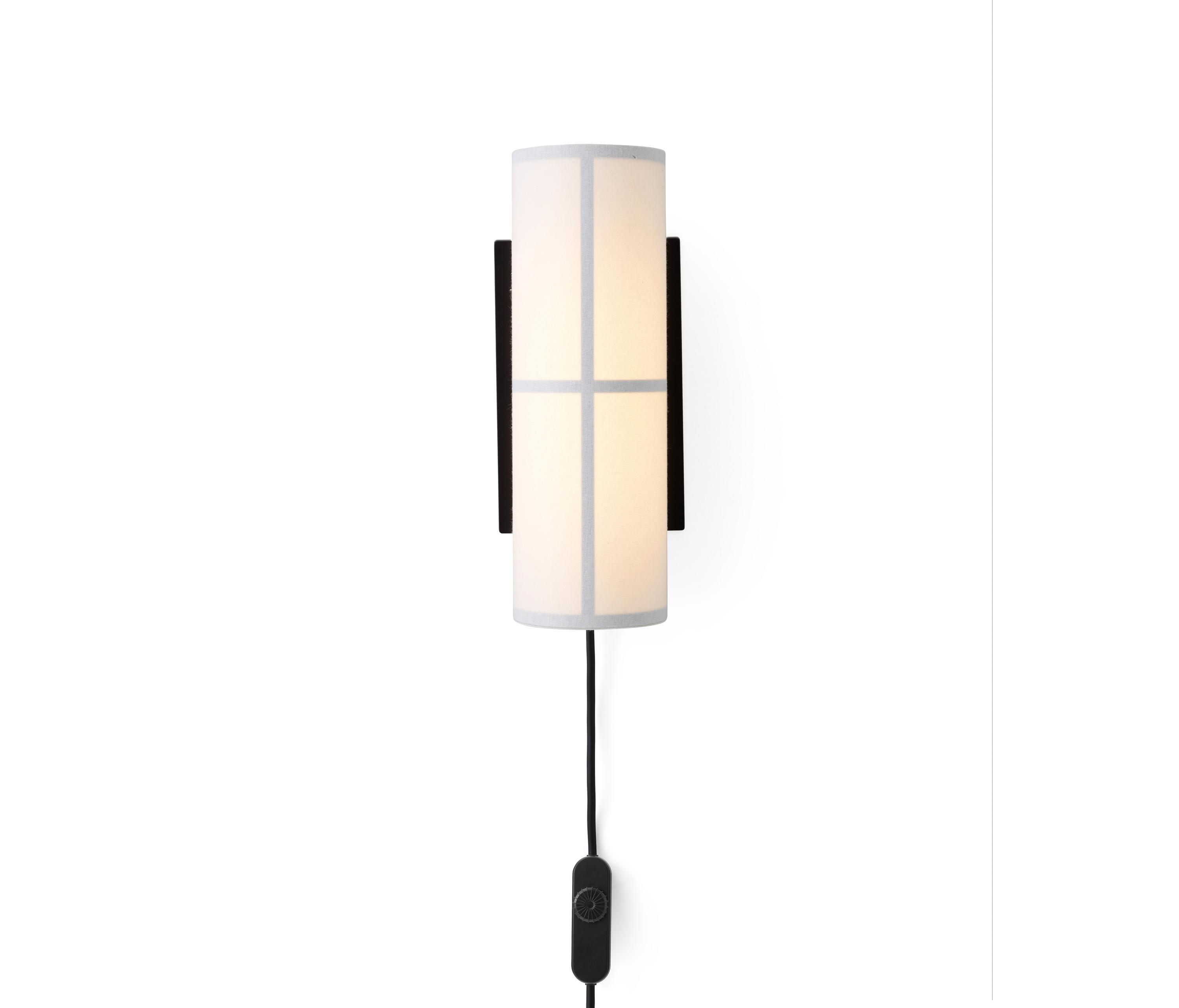 Scandinavian wall lamp photographed on a clean white studio background featuring minimalist Nordic design.