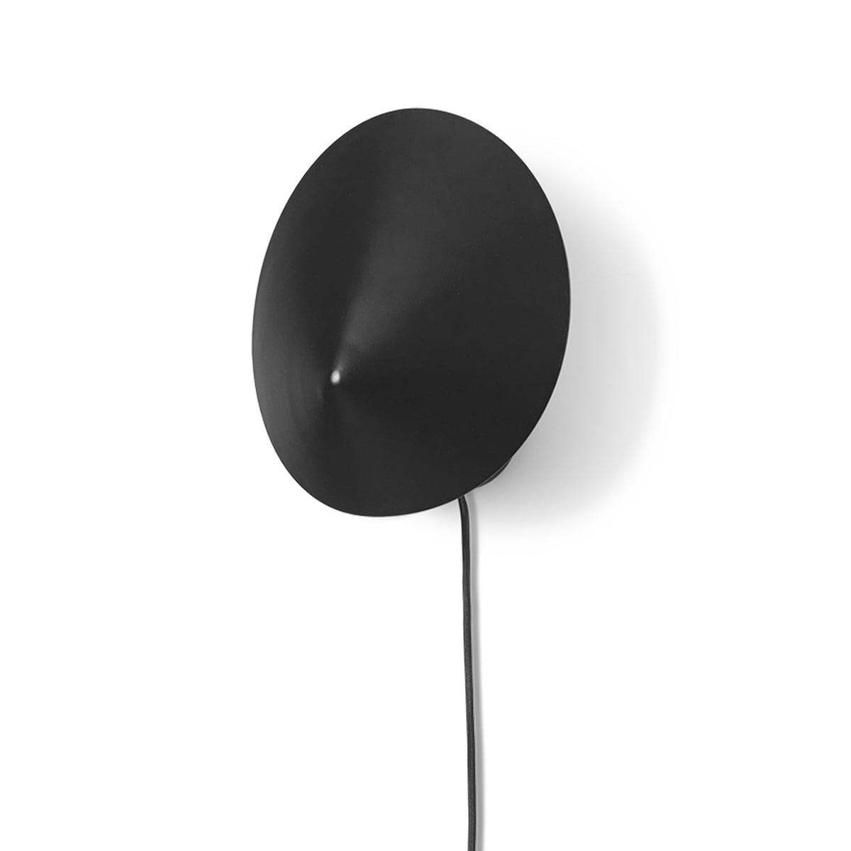 Scandinavian wall lamp photographed on a clean white studio background featuring minimalist Nordic design.