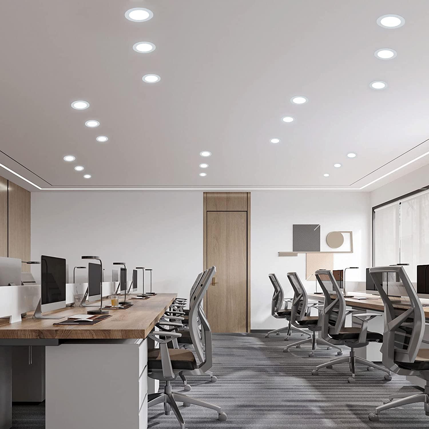 Smart recessed downlights installed in a modern office environment.