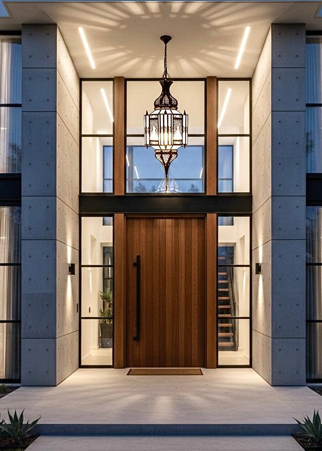 Lantern chandelier installed in a luxury residential entrance hall with timeless architectural styling.