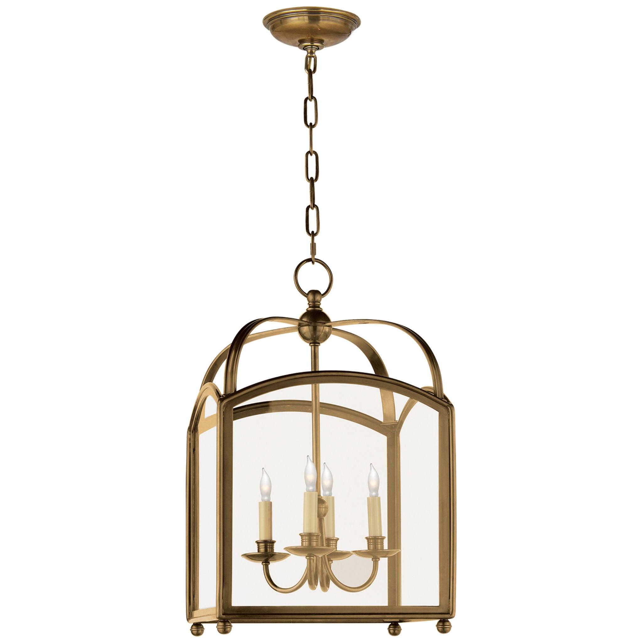 Lantern chandelier photographed on a clean white studio background.
