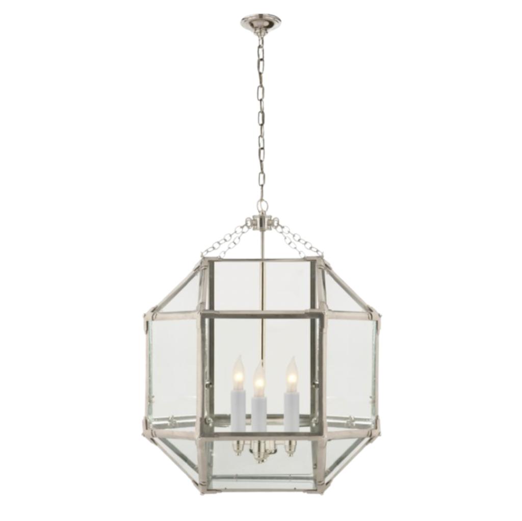Lantern chandelier photographed on a clean white studio background.