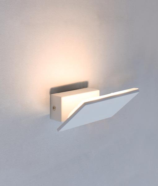 Front view of a contemporary wall lamp with premium materials and minimalist detailing.