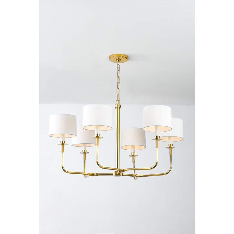 Front view of a transitional chandelier combining classic and contemporary design.