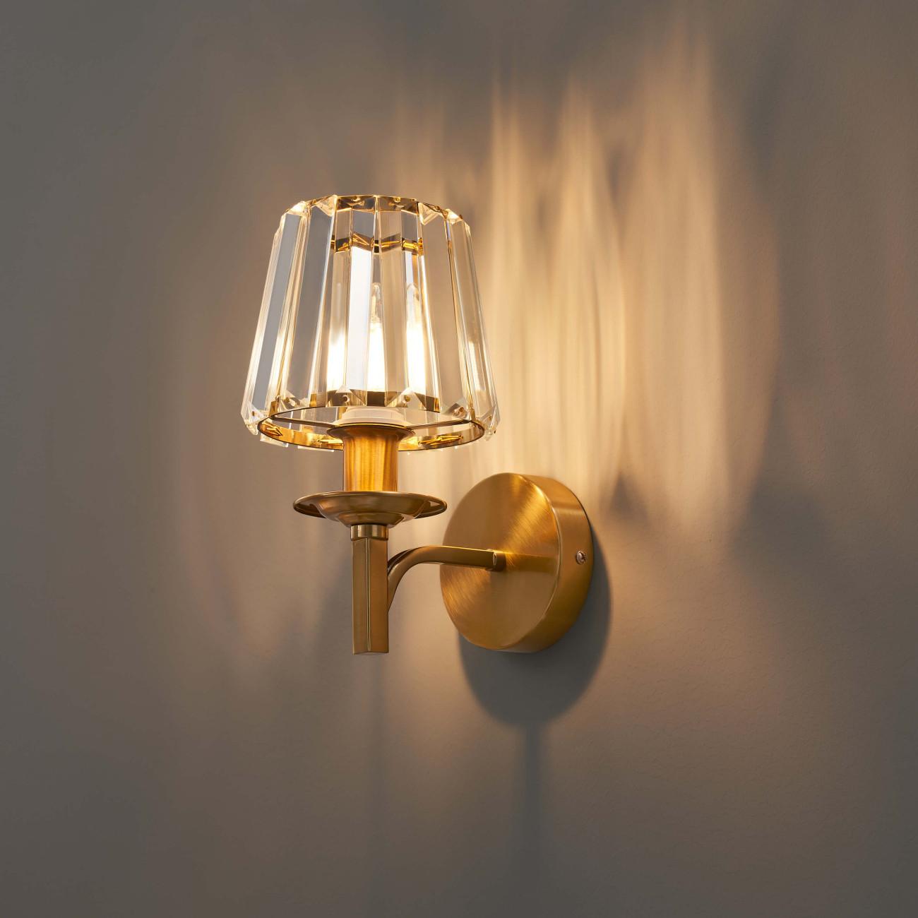 Front view of a luxury decorative wall lamp with elegant architectural proportions.