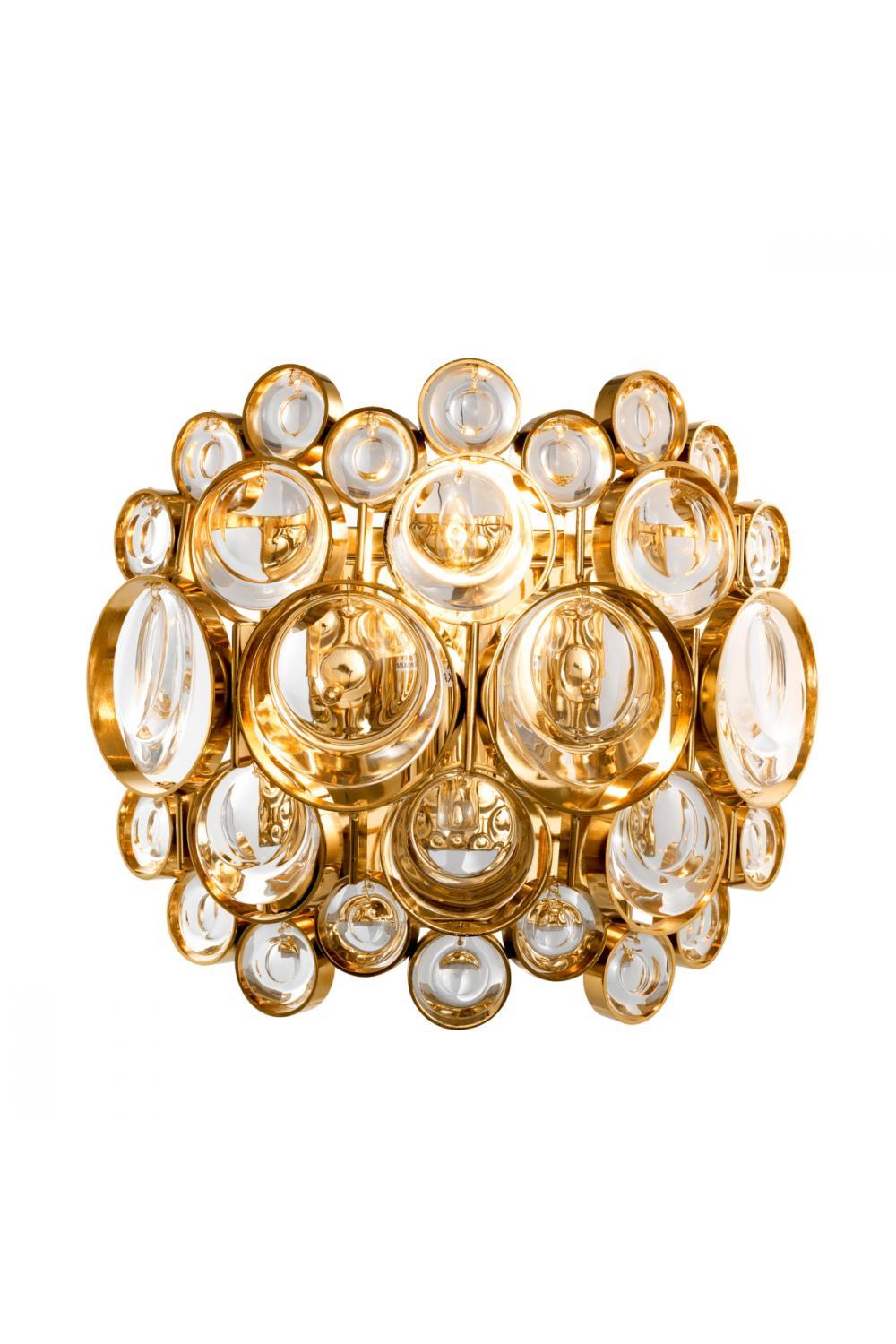 Luxury wall lamp photographed on a clean white studio background featuring premium materials and refined detailing.
