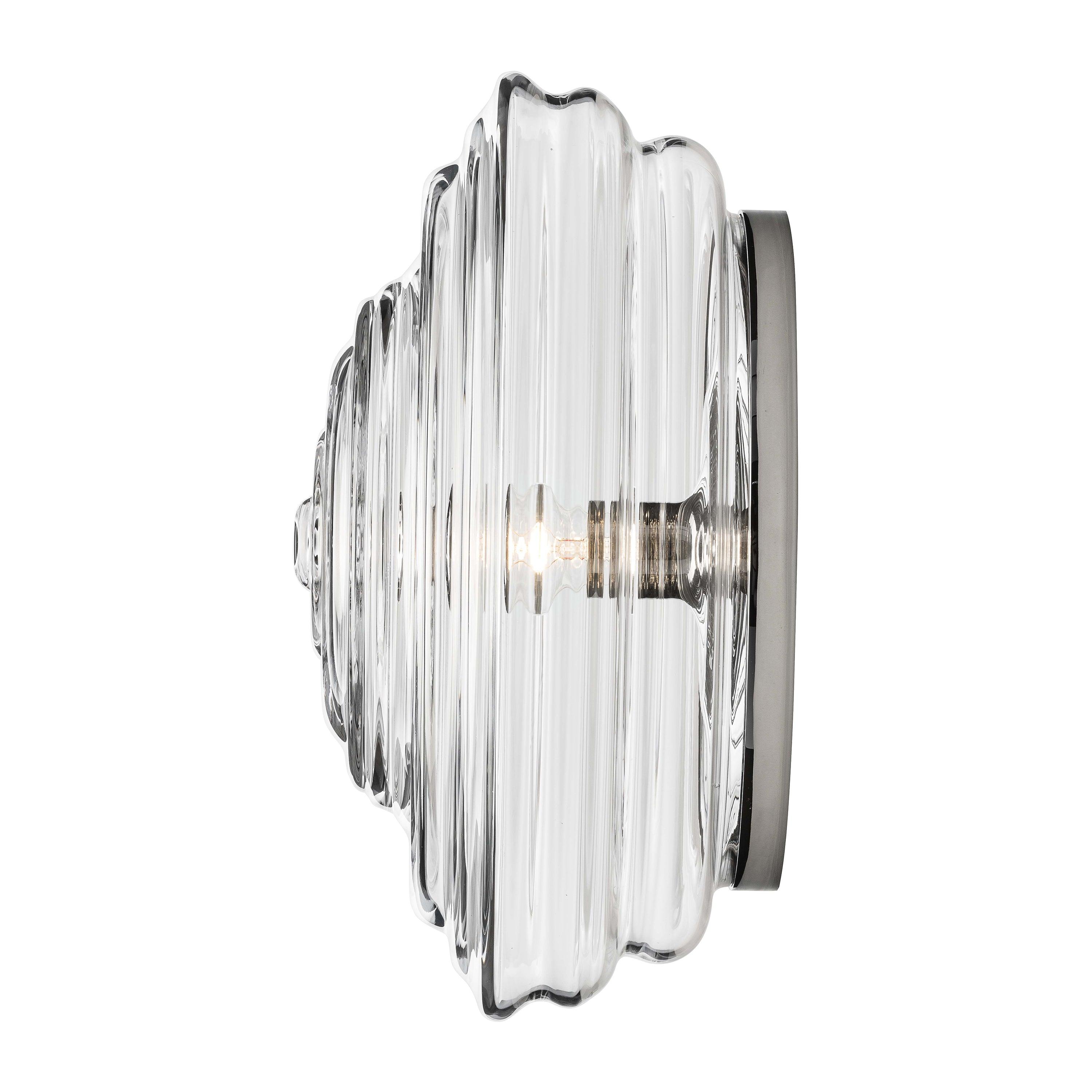 Luxury wall lamp photographed on a clean white studio background featuring premium materials and refined detailing.