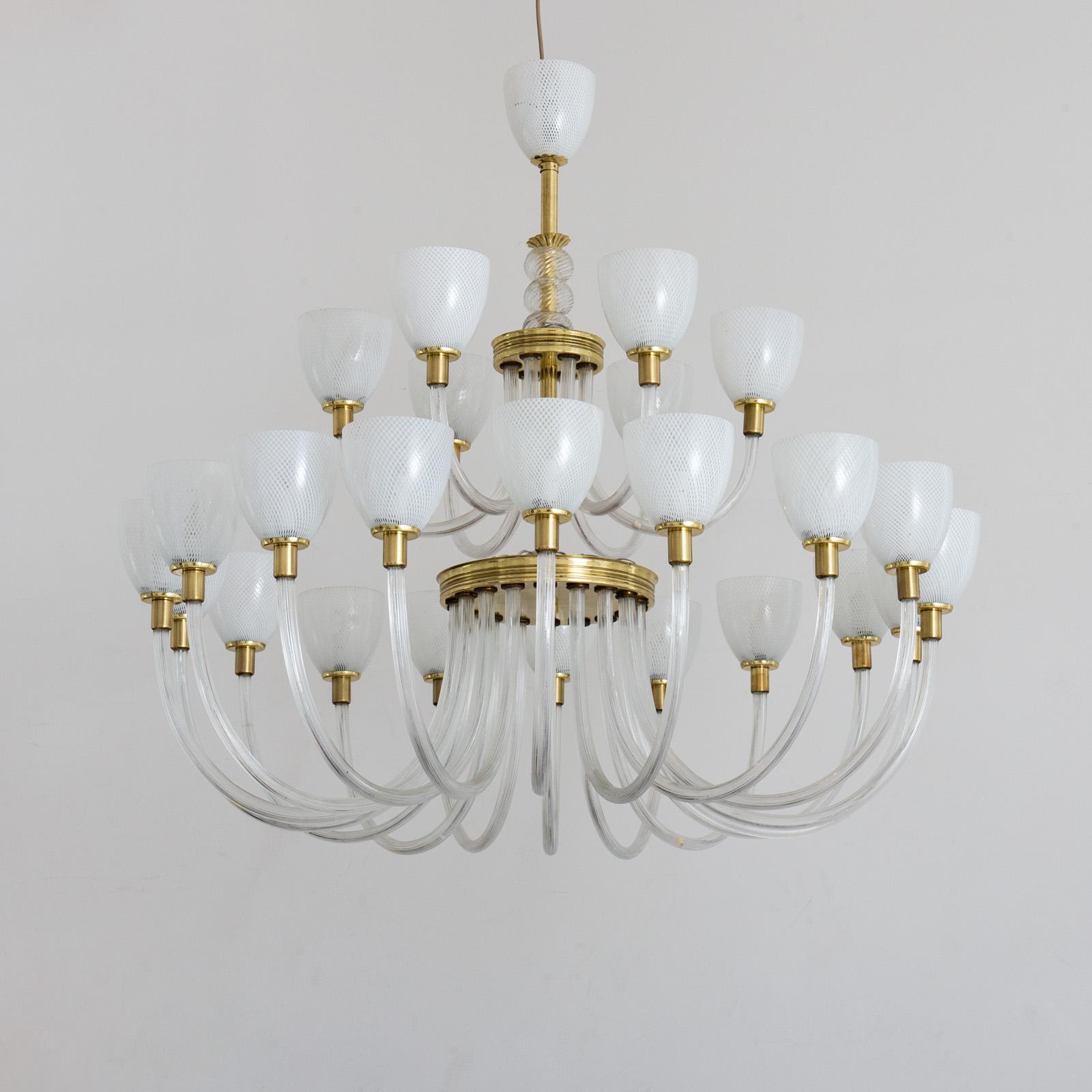 Front view of an elegant Murano chandelier featuring artistic hand-blown glass.