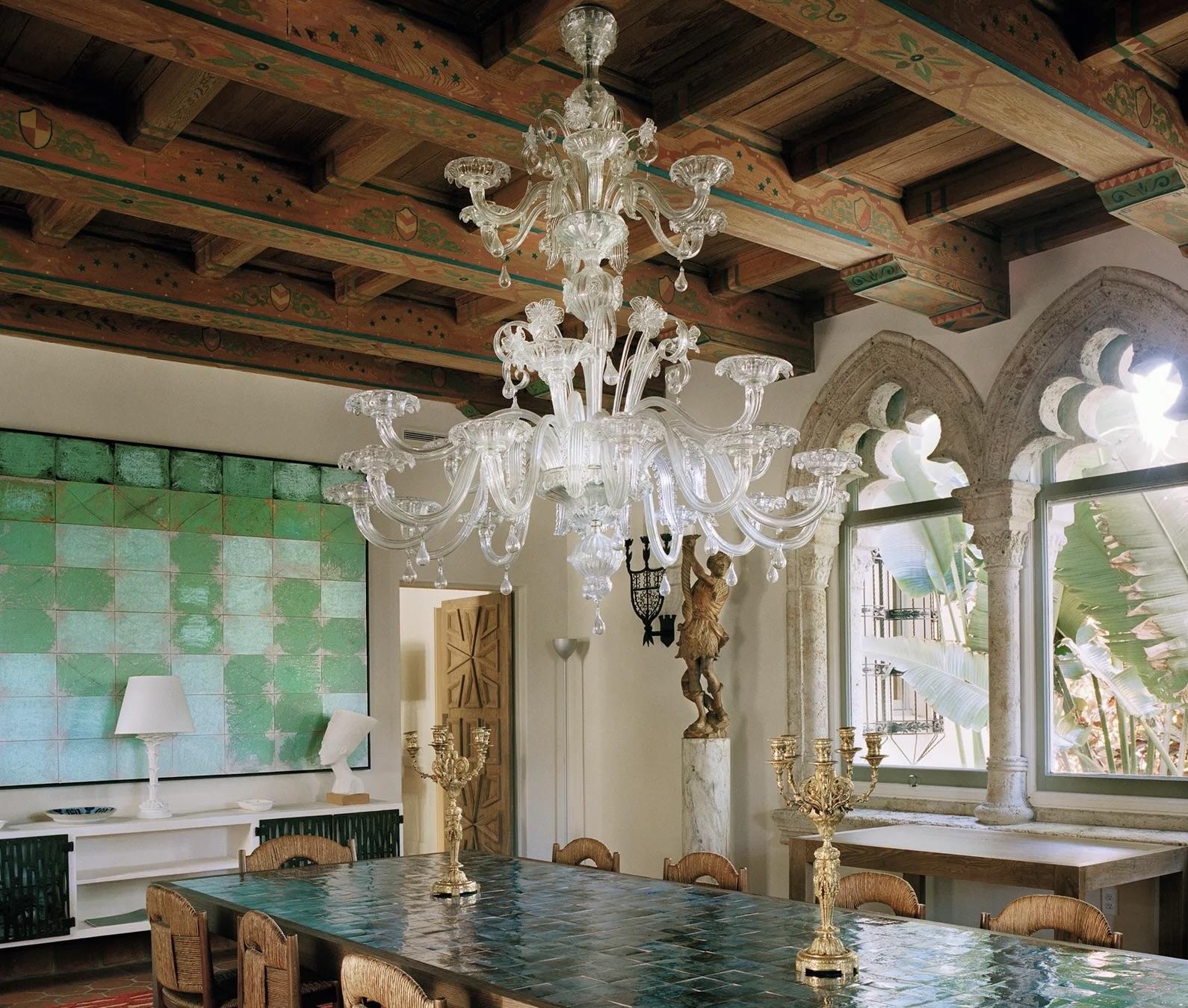 Murano chandelier installed in a luxury hospitality interior with refined architectural styling.