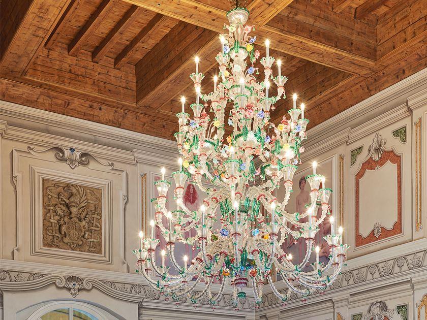 Murano chandelier installed in a luxury hospitality interior with refined architectural styling.