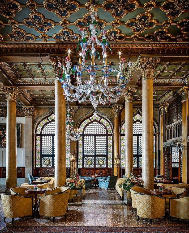 Murano chandelier installed in a luxury hospitality interior with refined architectural styling.