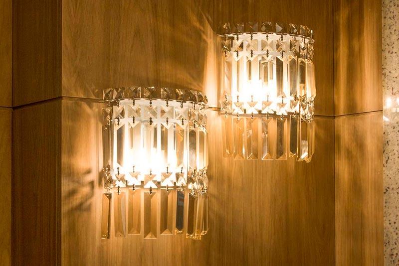 Crystal wall lamp family showcasing contemporary, classic and sculptural crystal lighting collections.