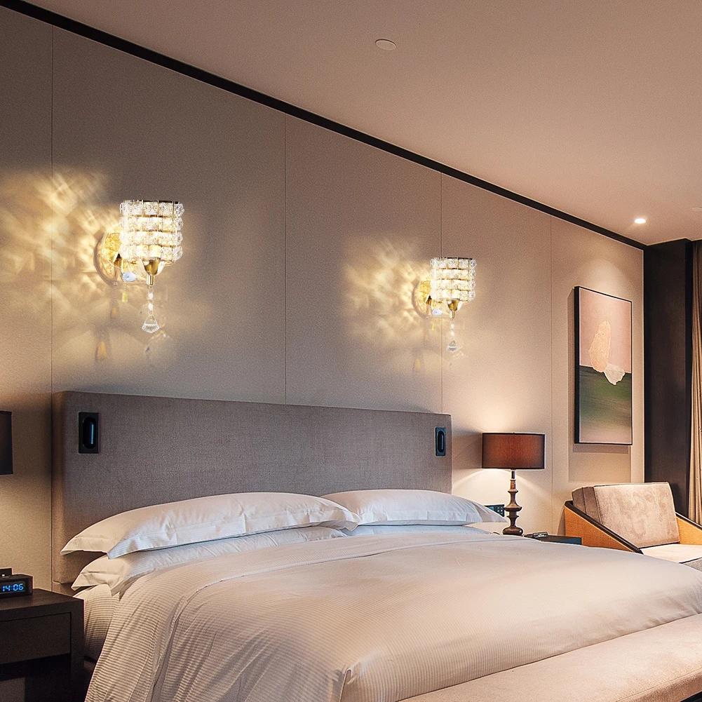 Crystal wall lamp installed in a luxury hotel lobby with refined architectural interiors.