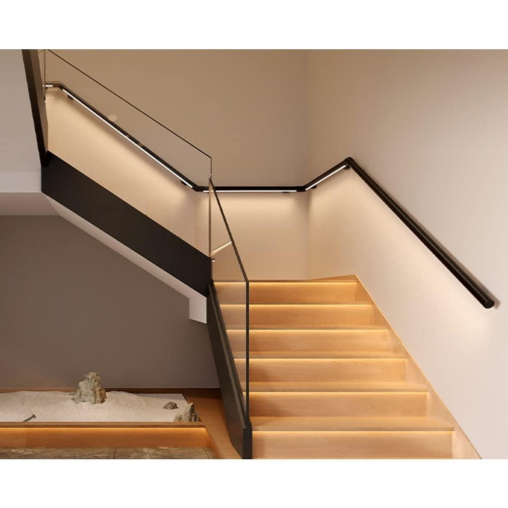 LED handrail profile integrated into a contemporary architectural staircase.
