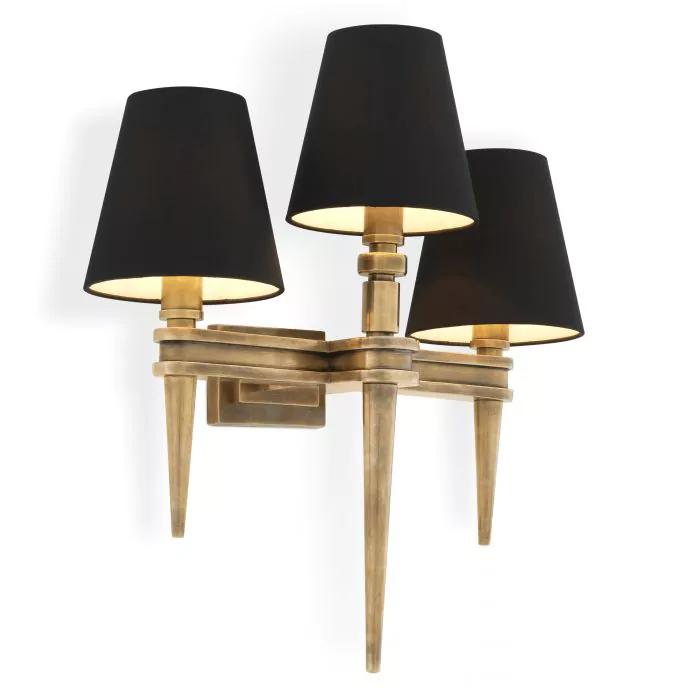 Classic wall lamp photographed on a clean white studio background featuring traditional European detailing.
