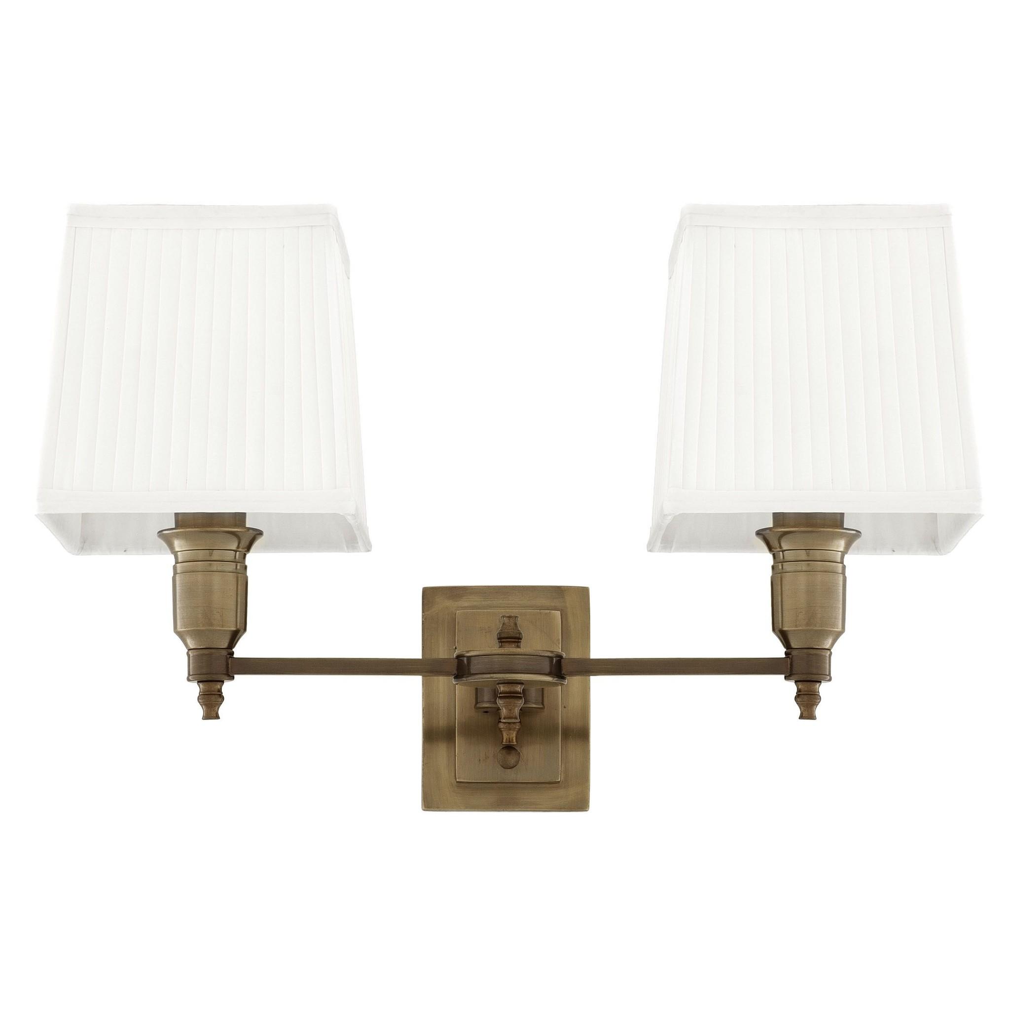 Classic wall lamp photographed on a clean white studio background featuring traditional European detailing.