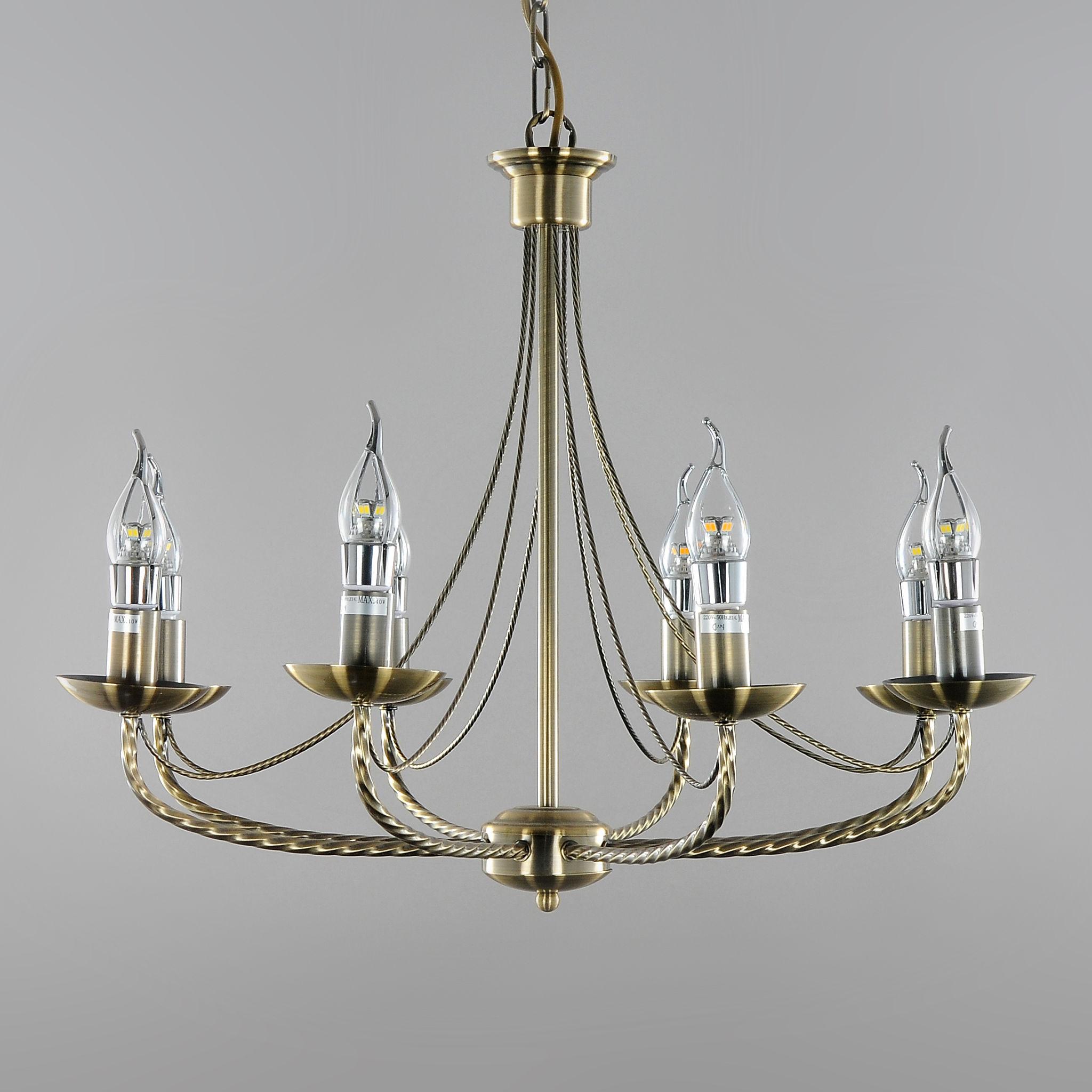 Candle-style chandelier photographed on a clean white studio background.