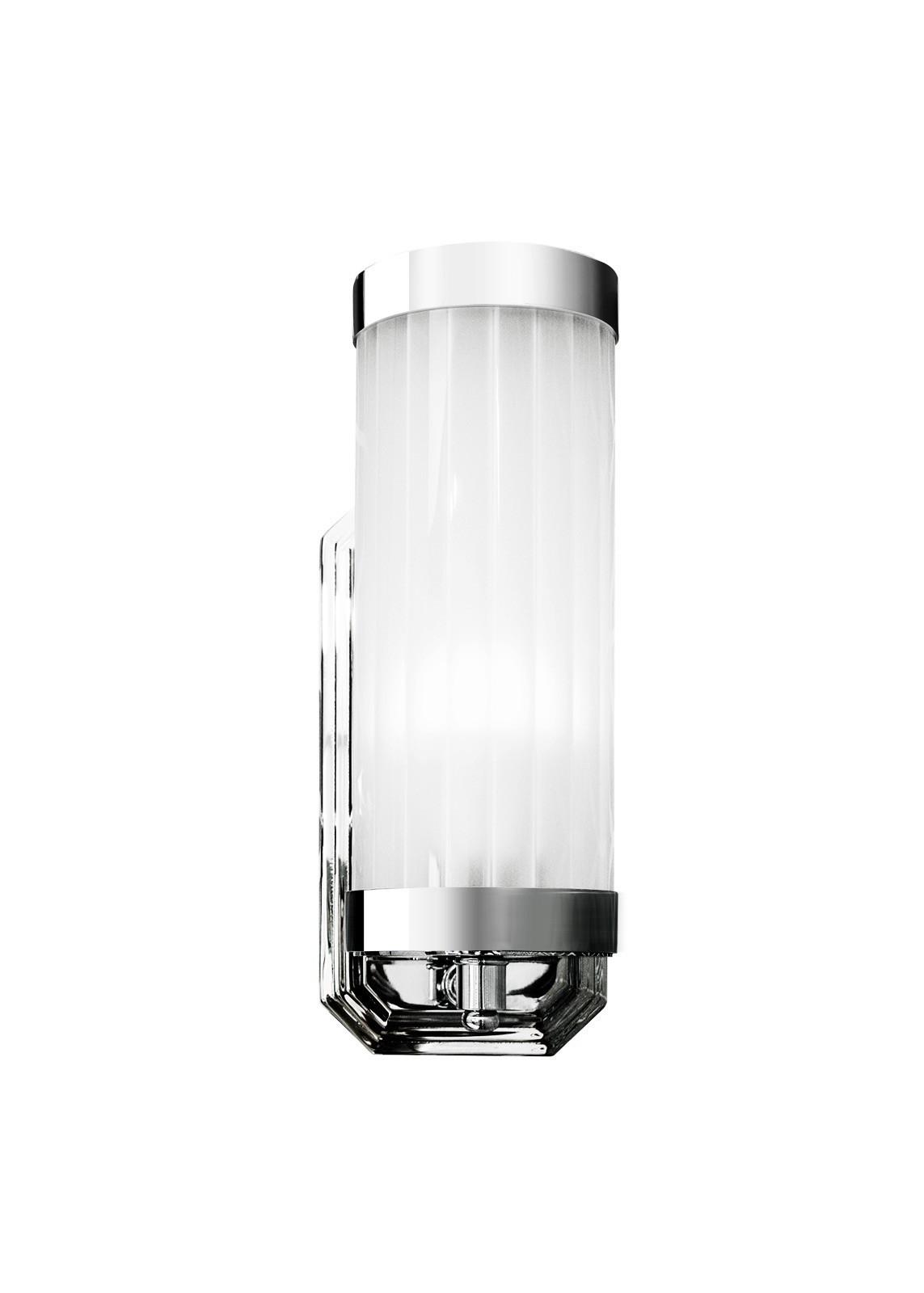 Art Deco wall lamp photographed on a clean white studio background featuring elegant geometric detailing.