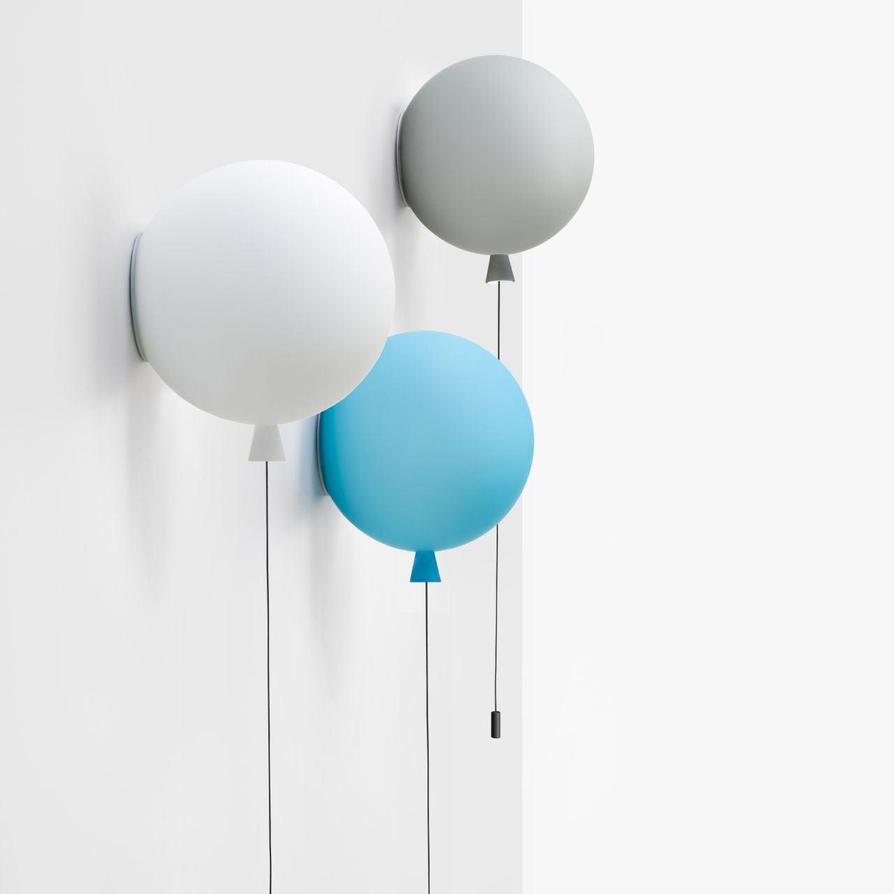 Globe wall lamp family showcasing multiple sizes, finishes and glass options.
