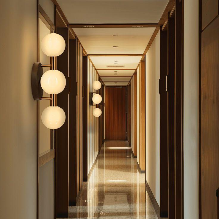 Globe wall lamp installed in a premium hospitality interior with contemporary architectural styling.