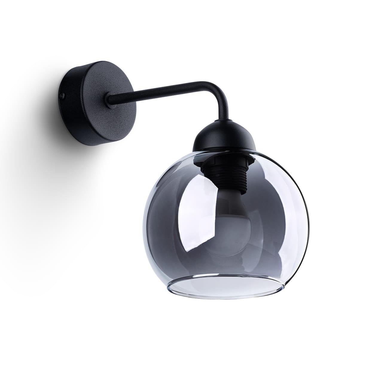 Globe wall lamp photographed on a clean white studio background with an elegant spherical glass diffuser.