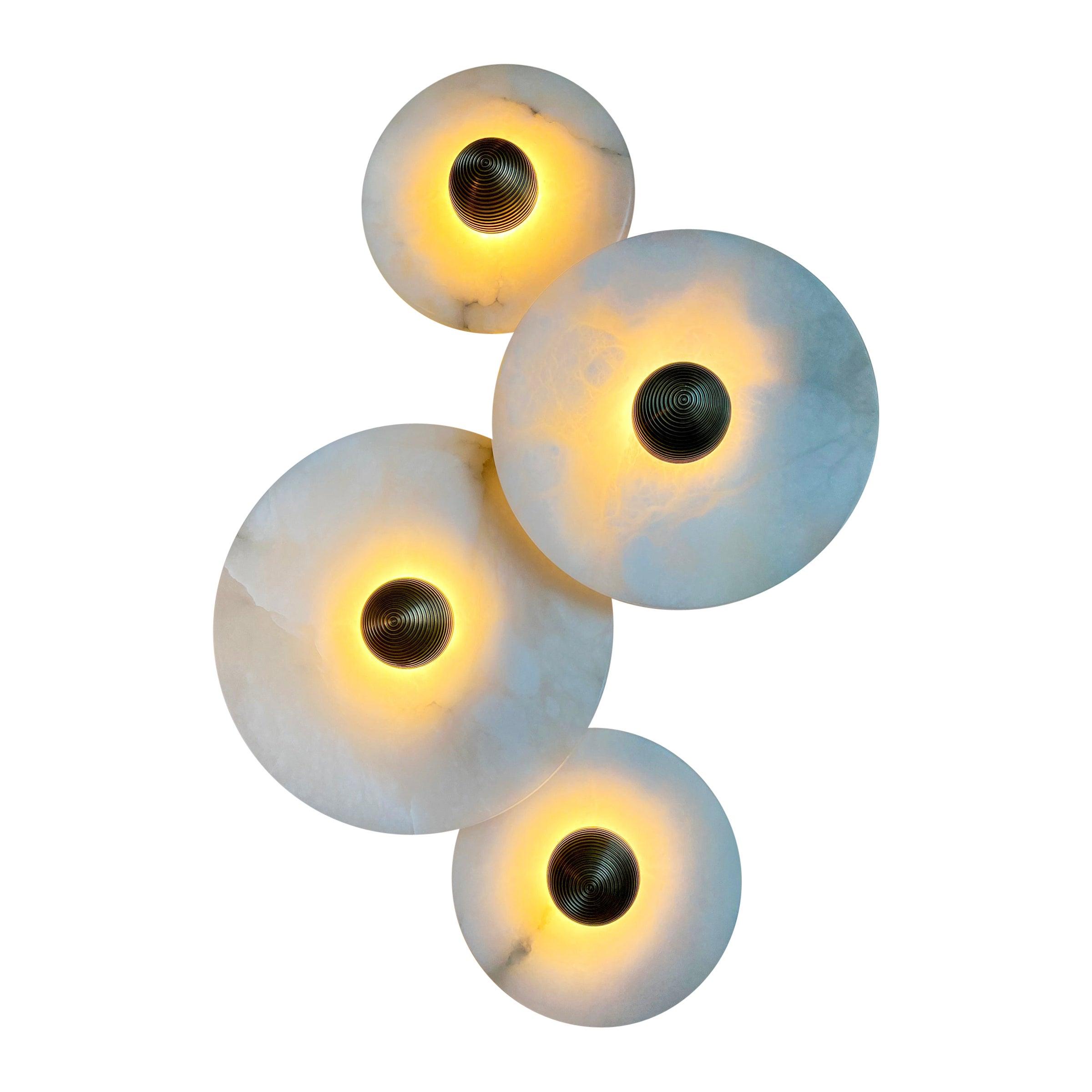 Sculptural wall lamp family showcasing artistic, geometric and organic decorative lighting collections.