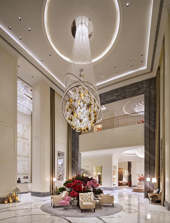 Signature lobby chandelier installed in a luxury hotel atrium.