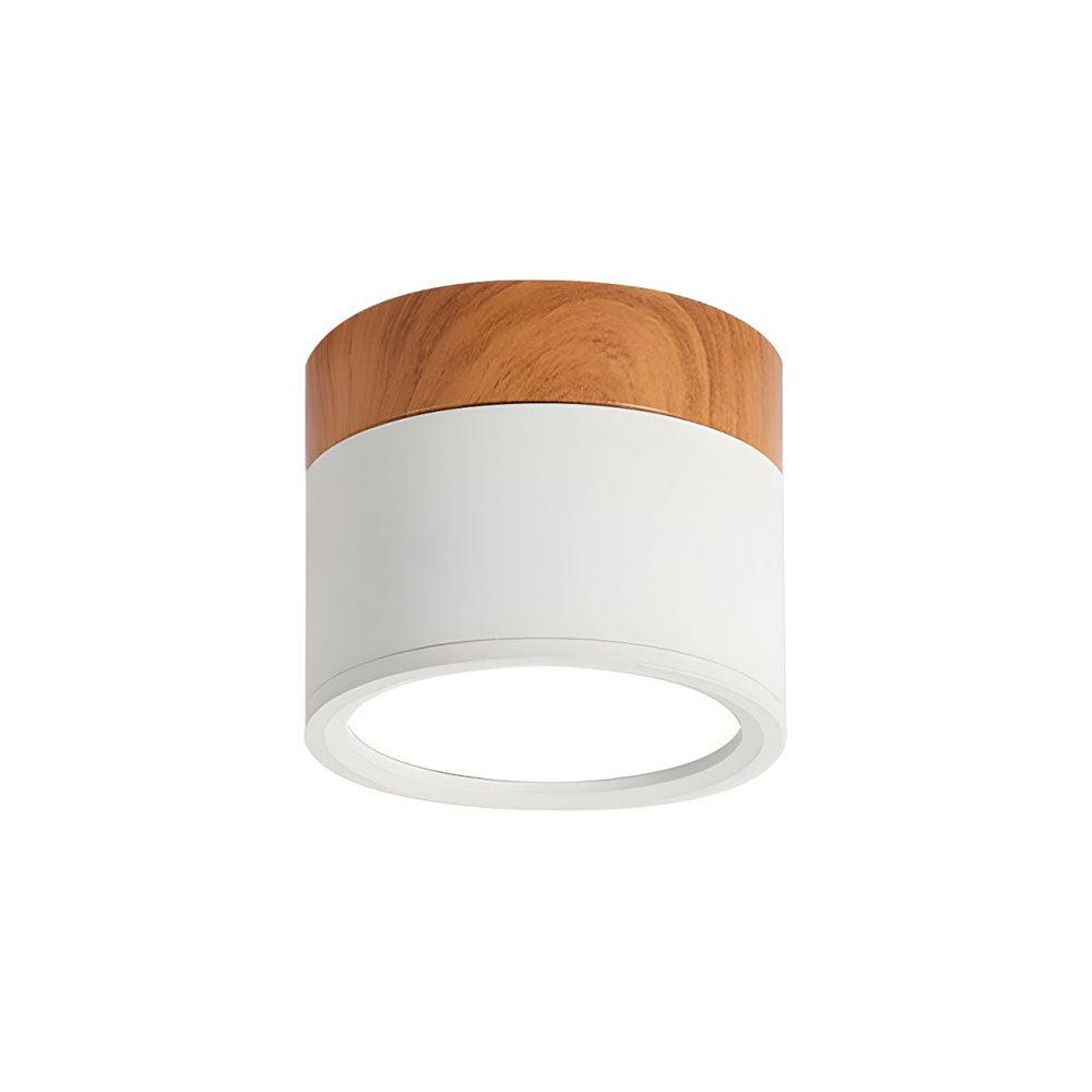 Scandinavian ceiling light with a light wood accent and clean cylindrical white diffuser
