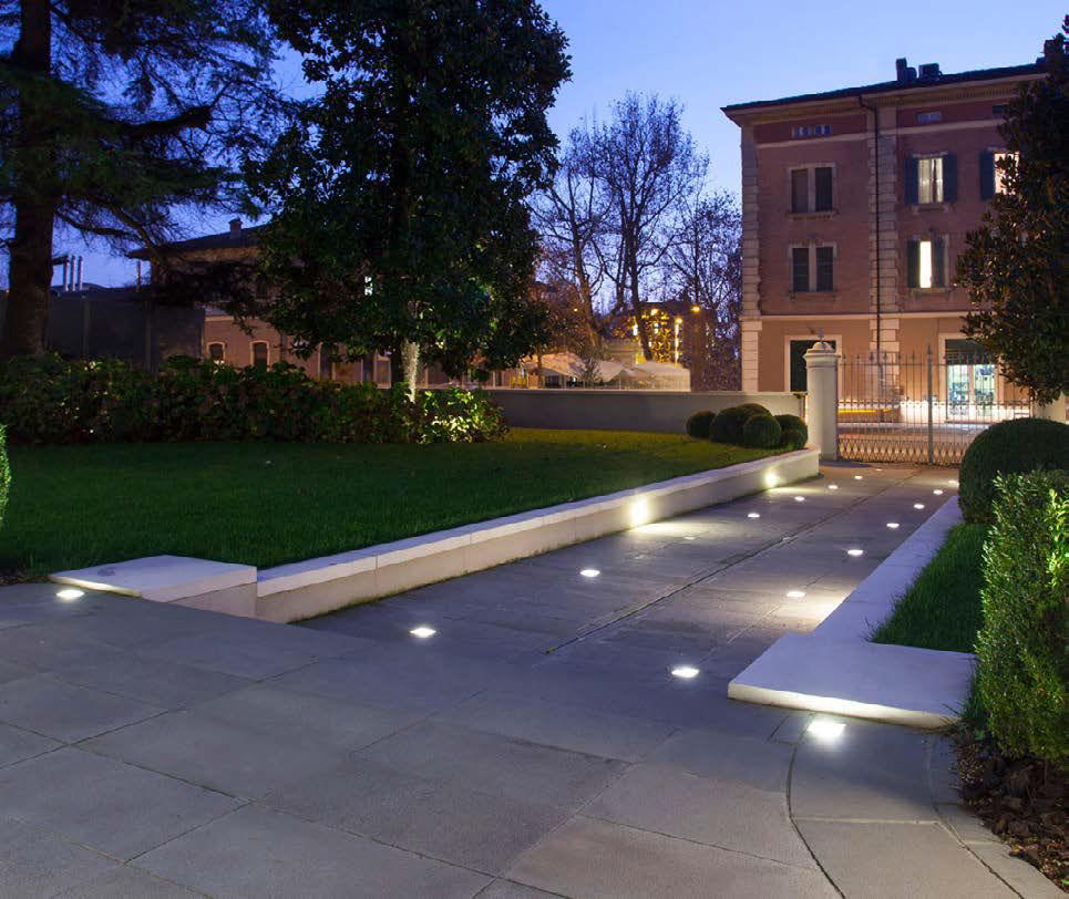 Square inground lights installed in a contemporary landscape and public space.