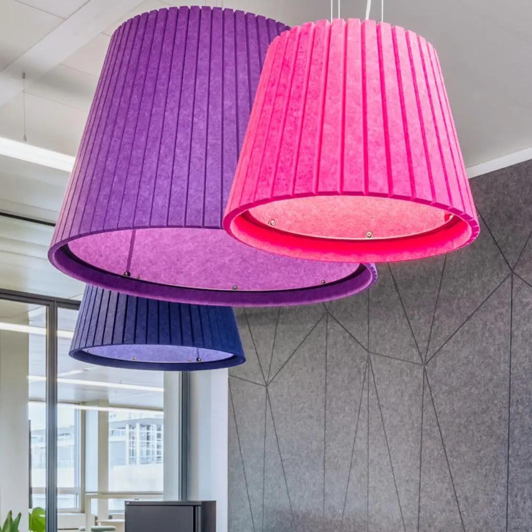 Suspended acoustic office lighting combining functional illumination with sound-absorbing elements for contemporary workplaces