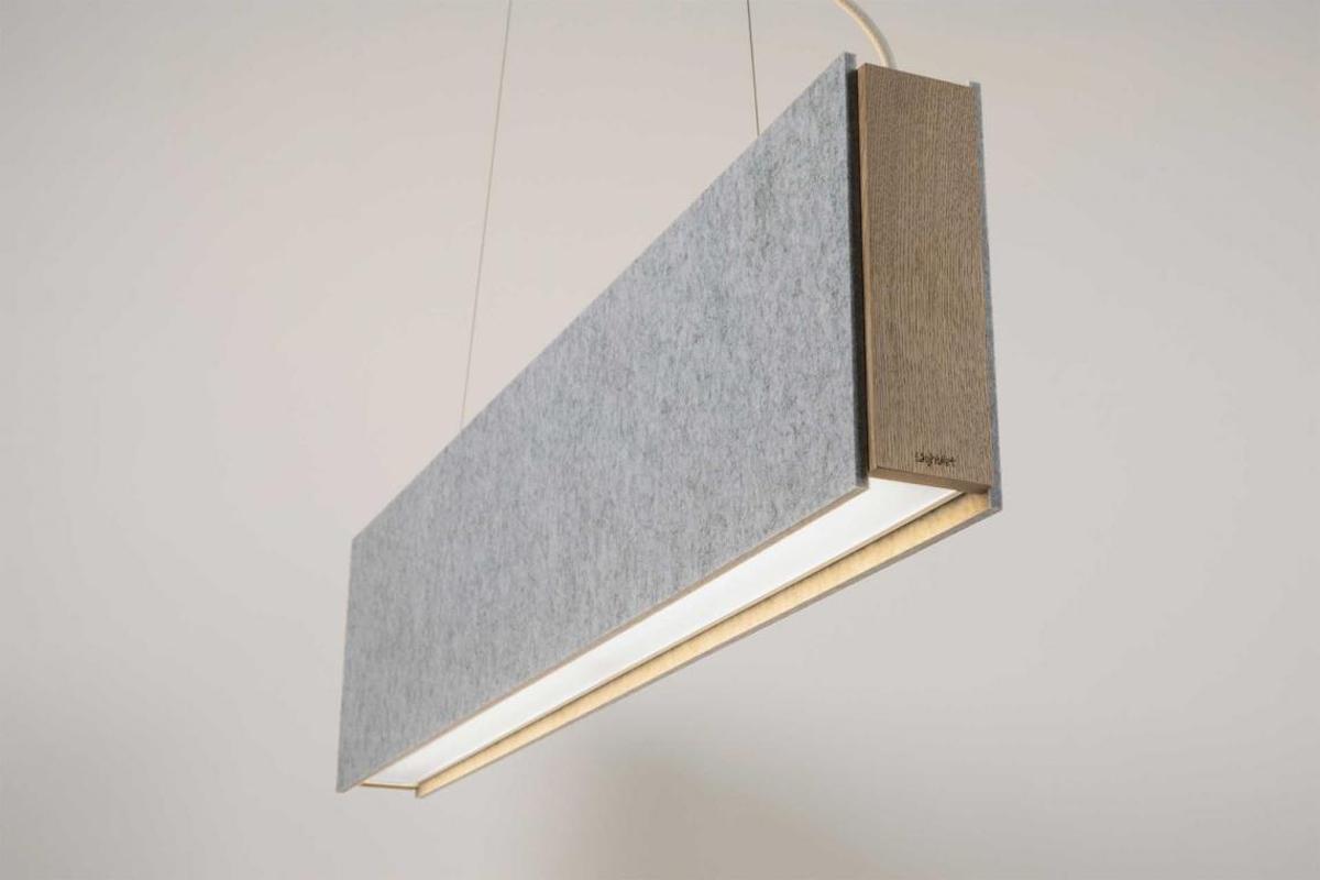Suspended acoustic office lighting combining functional illumination with sound-absorbing elements for contemporary workplaces