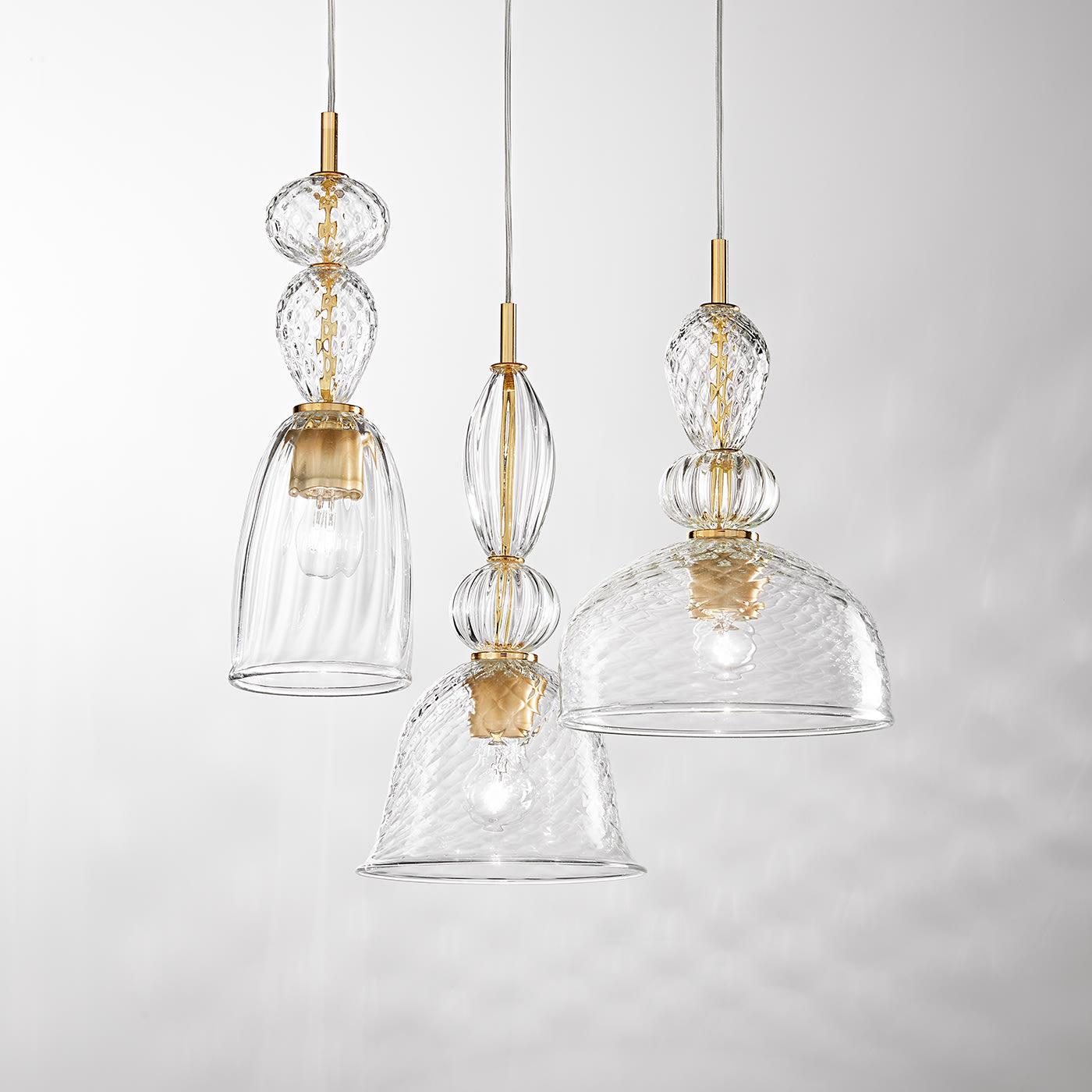 Glass pendant lighting family featuring multiple shapes and sizes.
