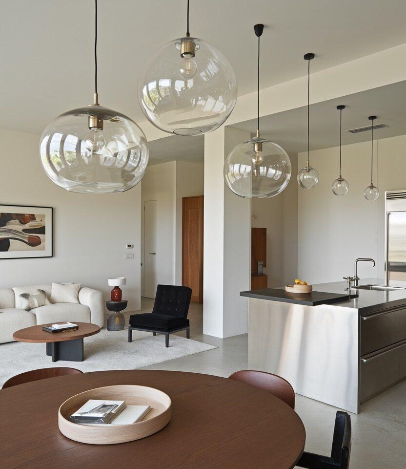 Glass pendant lighting installed in a premium hospitality interior.