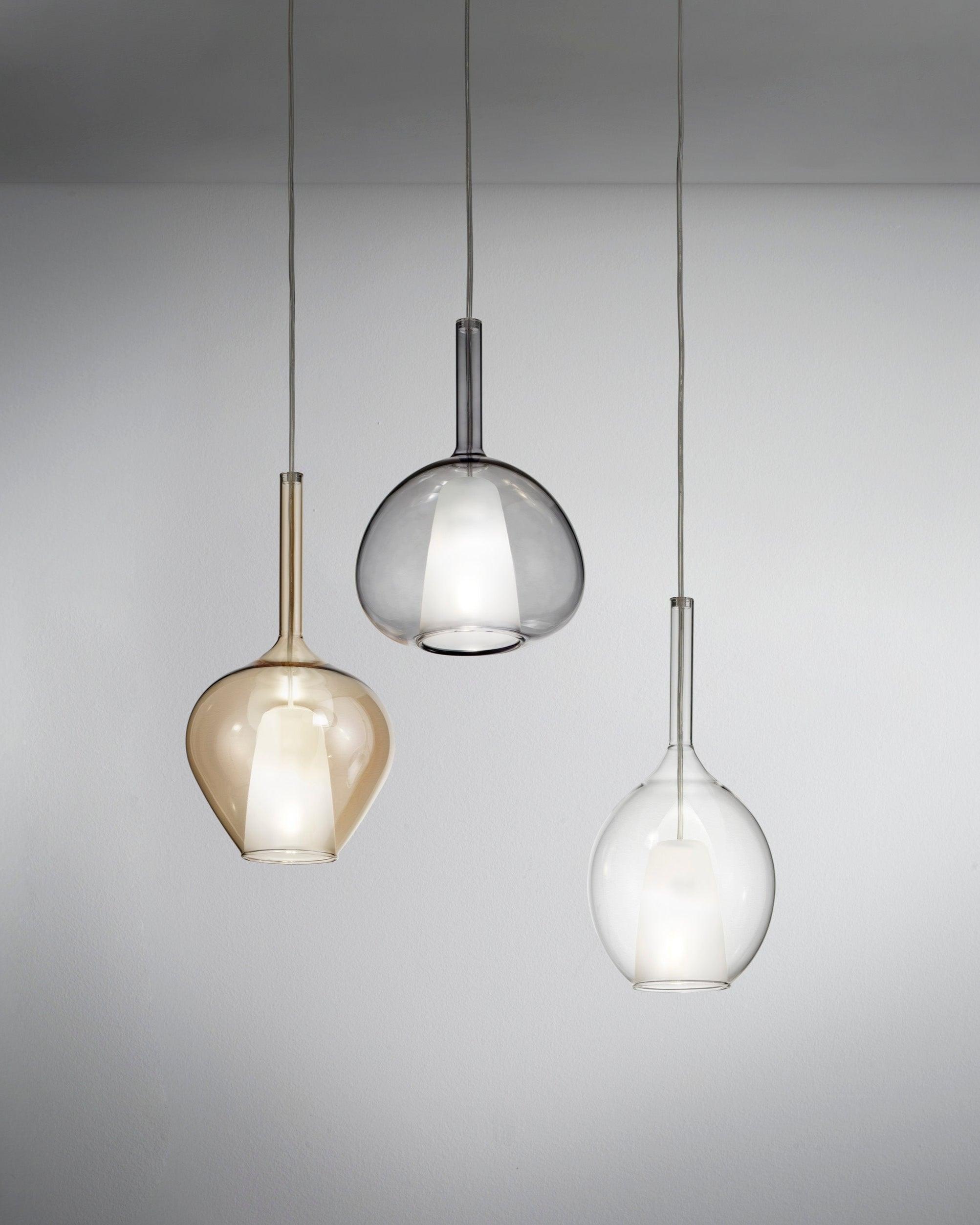 Glass pendant lighting family featuring multiple shapes and sizes.