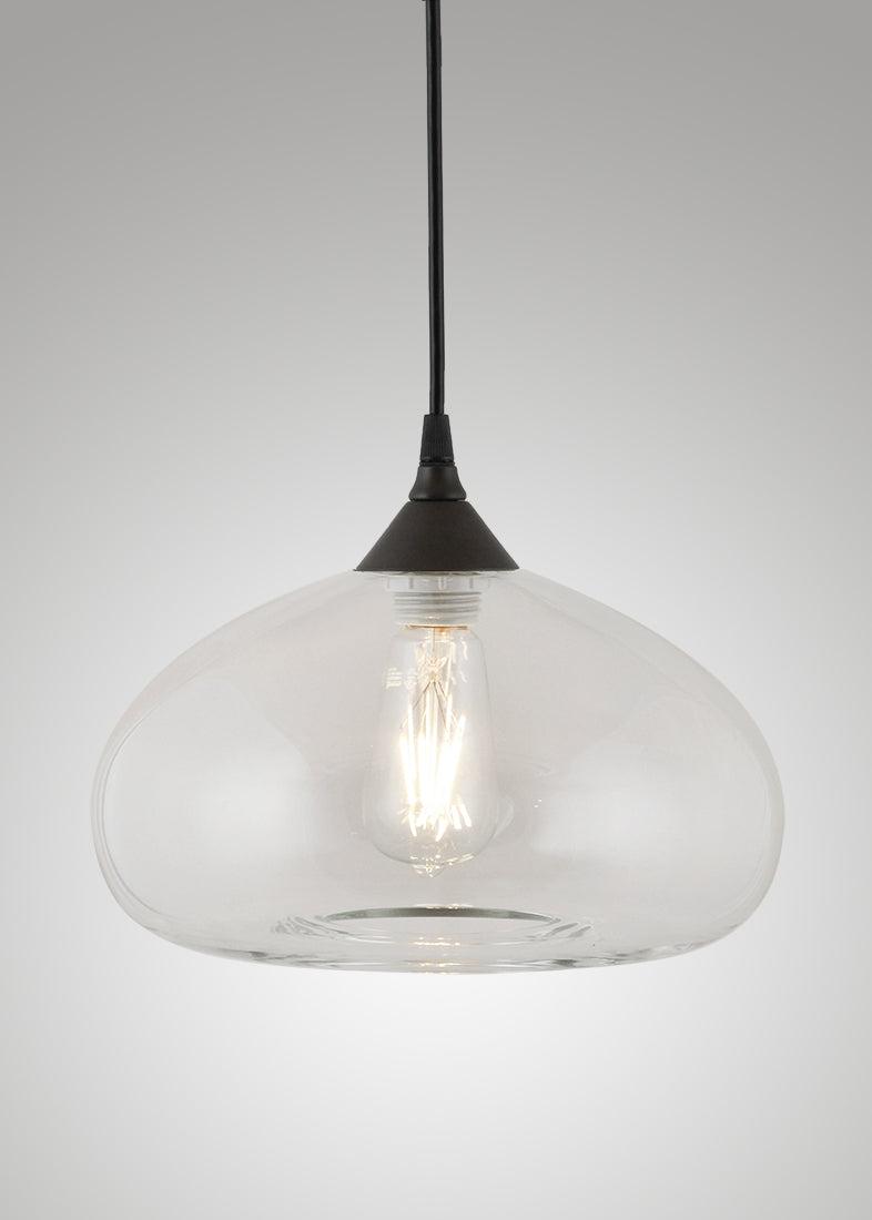 Front view of a decorative glass pendant light for architectural interiors.