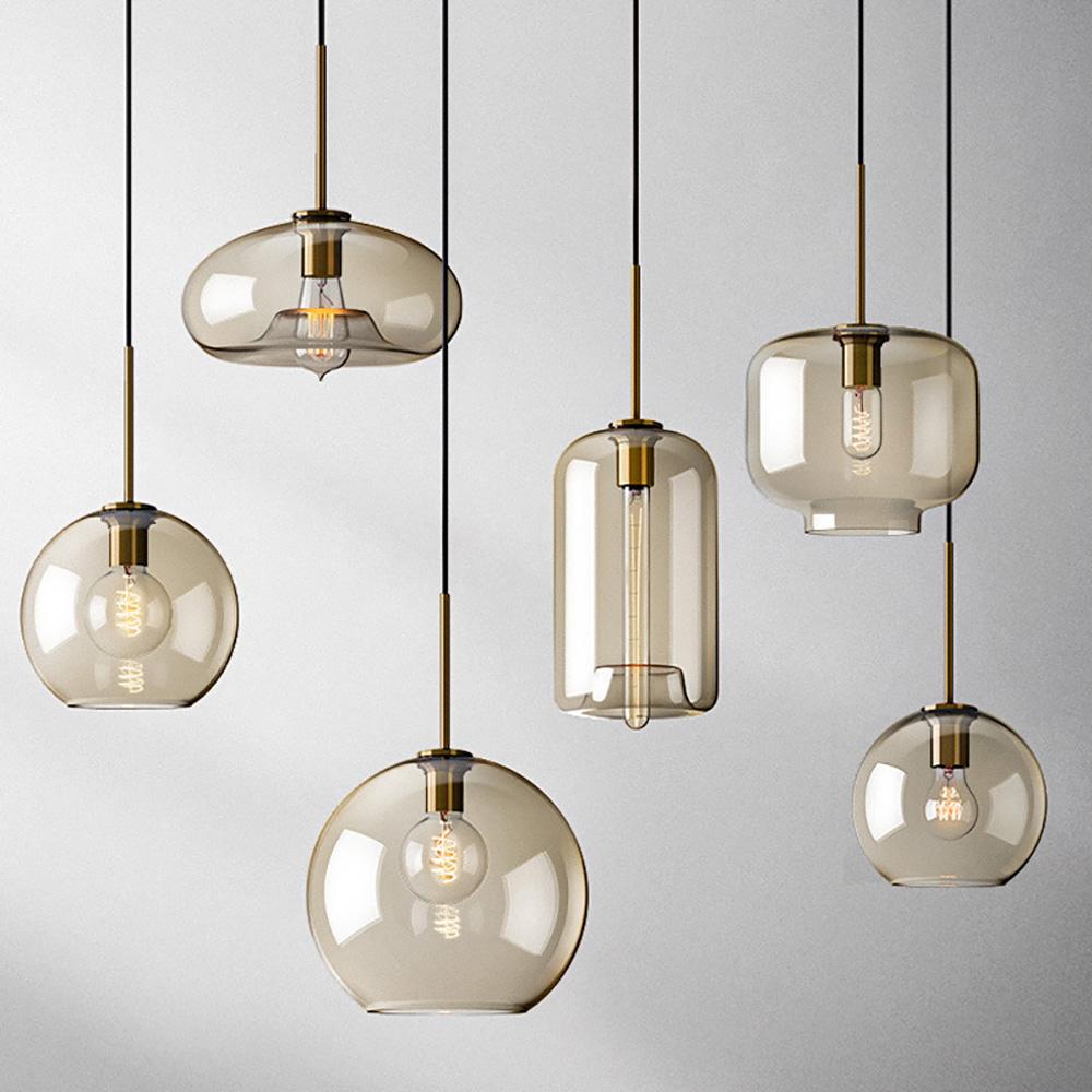 Glass pendant lighting family featuring multiple shapes and sizes.
