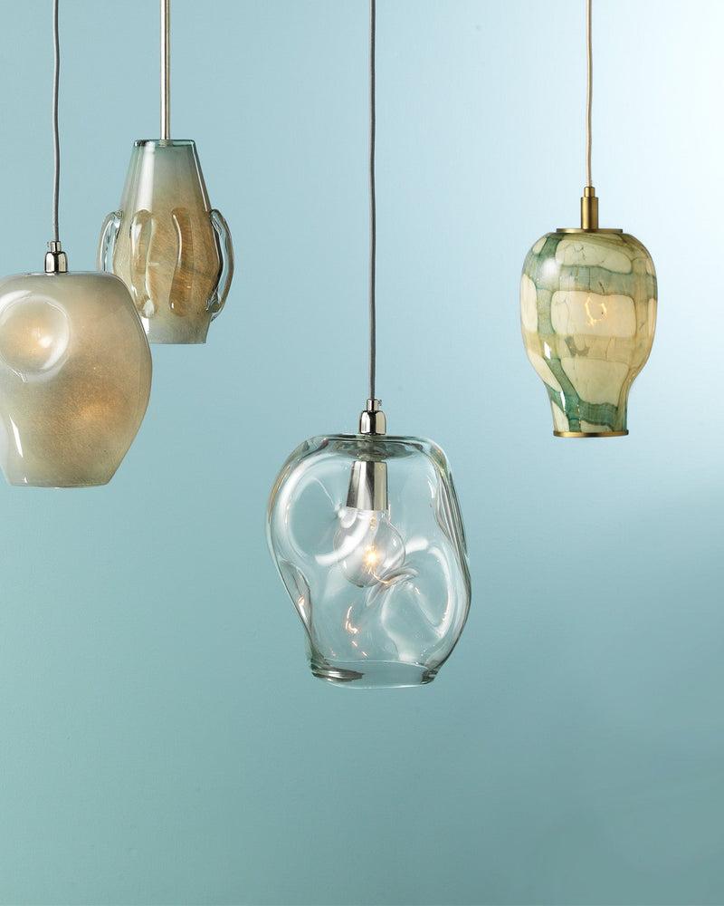 Glass pendant lighting family featuring multiple shapes and sizes.
