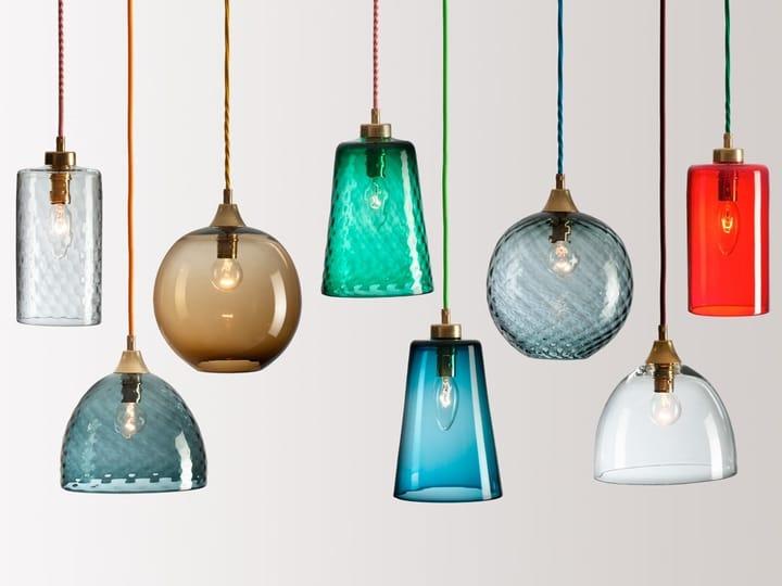 Glass pendant lighting family featuring multiple shapes and sizes.