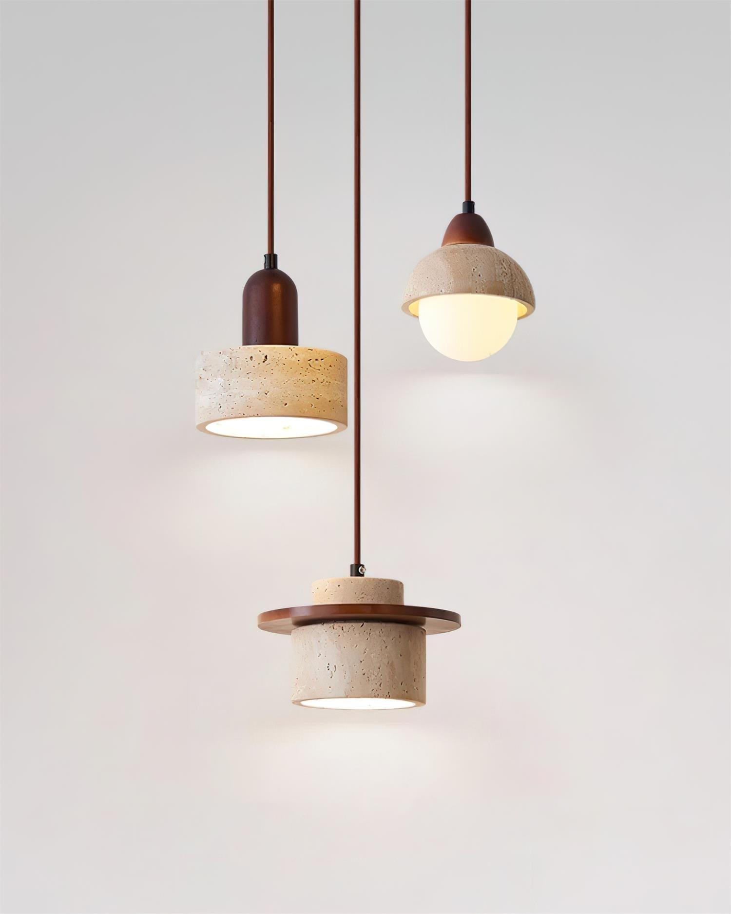 Stone pendant lighting family featuring multiple sizes and design variations.
