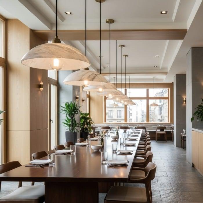 Stone pendant lighting installed in a premium hospitality interior.