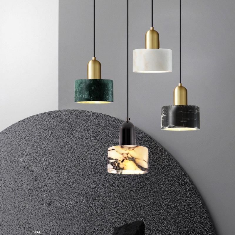 Stone pendant lighting family featuring multiple sizes and design variations.