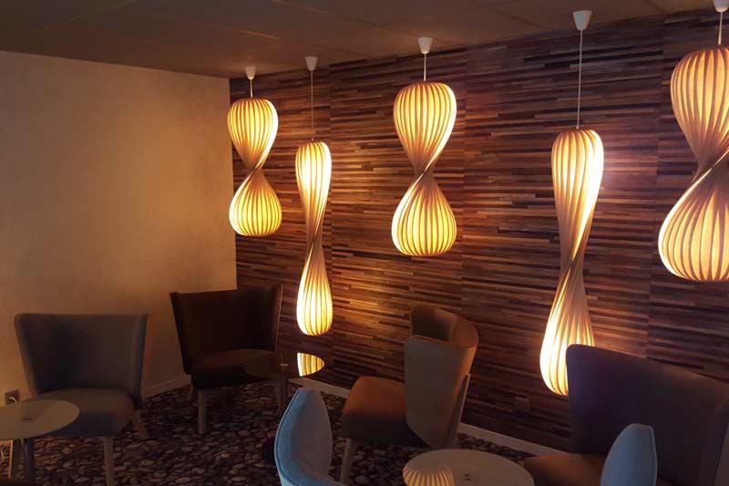 Organic pendant lighting installed in a premium hospitality interior.