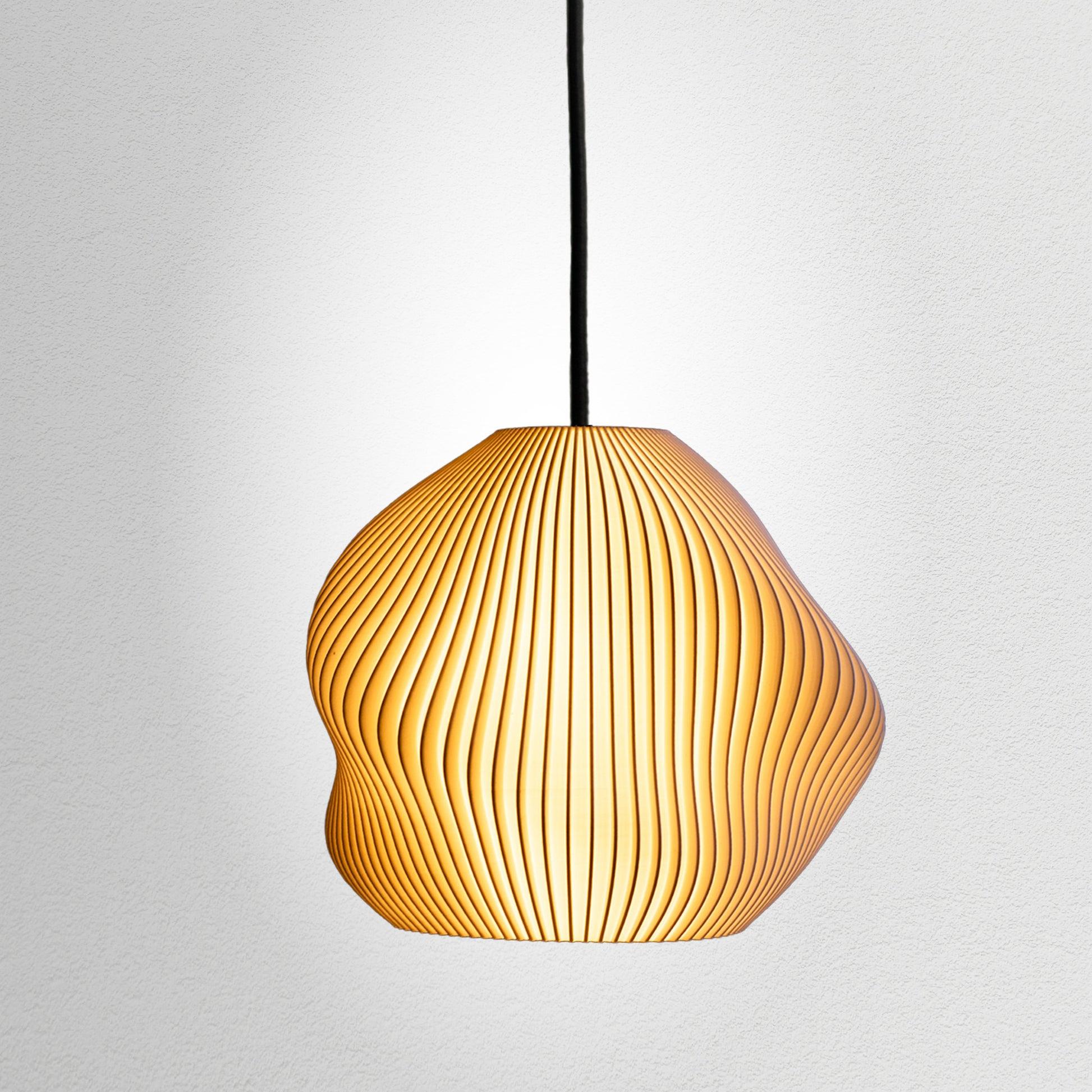 Front view of an organic pendant light for contemporary architectural interiors.